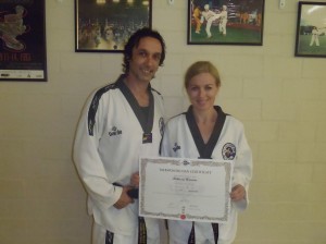 Melissa Warren passes her 4th Dan Blackbelt with Instructor & Husband Master Justin Warren