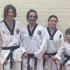 New Black Belt Promotions. John, Justin, Ajana Vanya