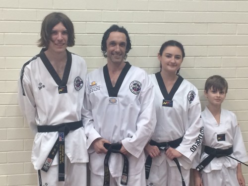 New Black Belt Promotions. John, Justin, Ajana Vanya