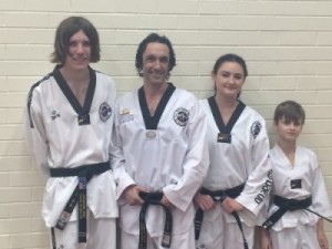 New Black Belt Promotions. John, Justin, Ajana Vanya