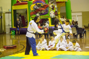 Kaiden Guiver Mid-flight during tornado kick - www.tkdcentral.com