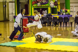 Narelle with an impressive Flying Side Kick - www.tkdcentral.com