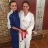 Ajana Plunkett (Head Instructor with Melanie Buhlman after grading for Probationary Black Belt. - www.tkdcentral.com