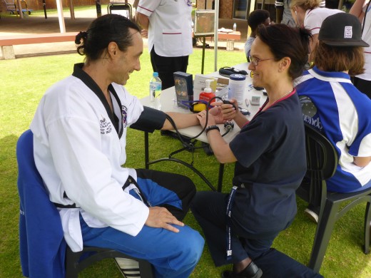 Master Justin Warren is health checked by Nurse Mel Buhlman