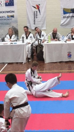 Deacon Malatesta Figuire 4 wrist locks his opponent at the Black belt Grading - www.tkdcentral,com