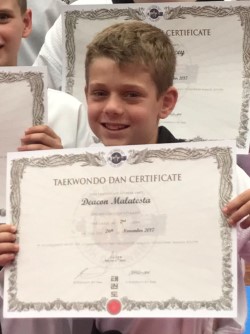 Deacon Malatesta with his Ohdokwan Black Belt Certificate - www.tkdcentral.com