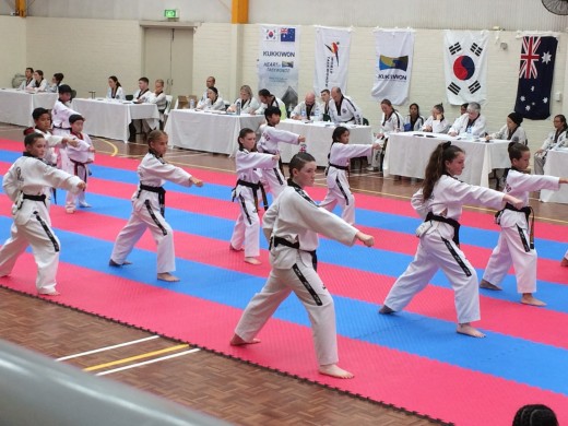 Maddison Booth, Mollie Swarbrick, Tahlia Gowland & Brooklyn Jauncey Doing Patterns during Black Belt Grading - www.tkdcentral.com