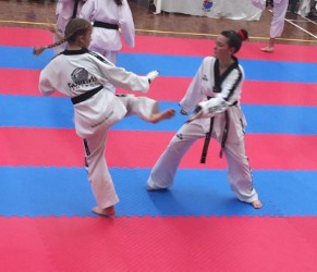 Molllie Swarbrick & Maddison Booth Sparring at the Black belt grading - www.tkdcentral.com