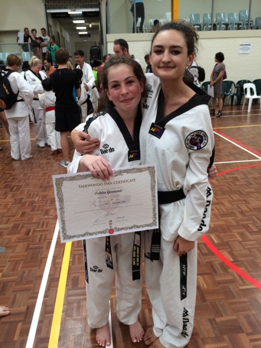 Tahlia Gowland with Ajana Plunkett after Black Belt Grading - www.tkdcentral.com