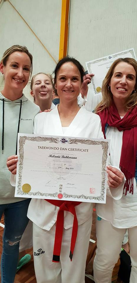 Kelly Rowe, New Black Belt Mel Buhlmann and Mortal Mouse Kristy Hitchens after the grading