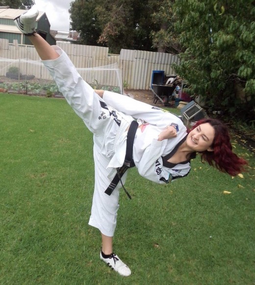 Ajana Plunkett Kicking As A 3rd Dan Blackbelt - www.tkdcentral.com