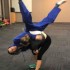 Head Instructor Ajana Plunkett Throws Master Justin Warren - www.tkdcentral.com - 2