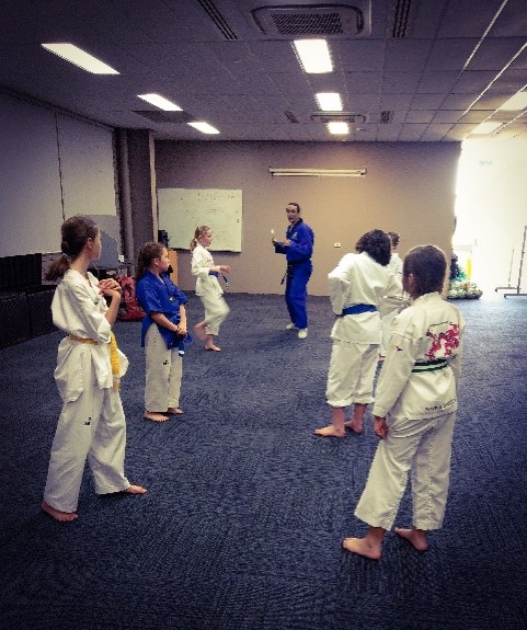 Master Justin Warren guides Paragon Program Members through Their Belt Examination - www.tkdcentral.com