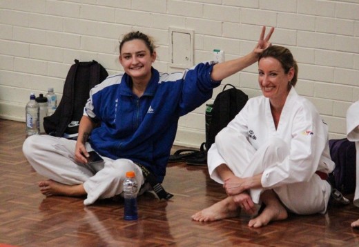 Head Instructor Ajana Plunkett Having Fun With Kelly Rowe At The 2018 Nov Black Belt Grading - www.tkdcentral.com