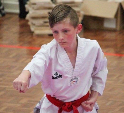 Jy Gamble During The Poomsae Section Of His Dan Grading - www.tkdcentral.com