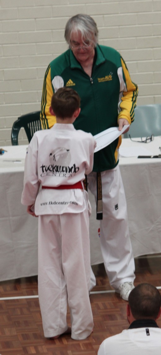 Jy Gamble Receives His Successful Black belt Result from Grandmaster Ross Hartnett - www.tkdcentral.com