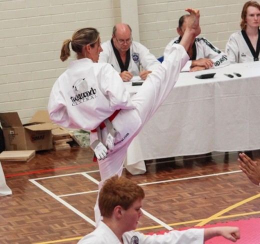 Kelly Rowe Demonstrates A Hgh Front Kick At Her Black belt Grading - www.tkdcentral.com