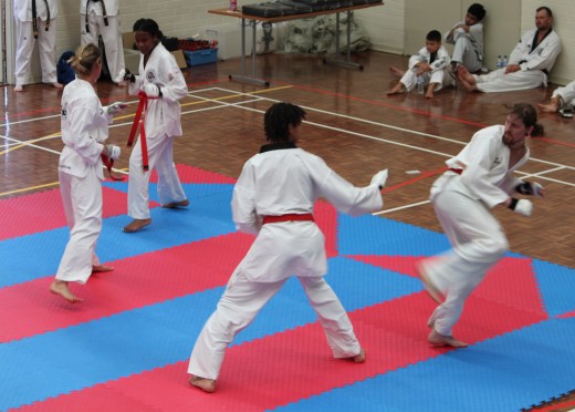 Kelly Rowe & Luke Crane Sparring Opponents During their 1st Dan Black belt grading - www.tkdcentral.com