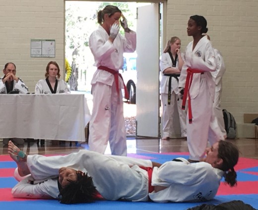 Luke Crane Applies A Side Arm Lock At His Black Belt Grading - www.tkdcentral.com