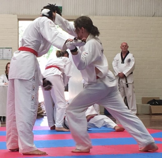 Luke Crane Knee Strikes During His Black Belt Grading - www.tkdcentral.com