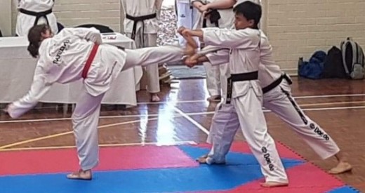 Luke Crane Smashes His Board At His Black belt Grading - www.tkdcentral.com